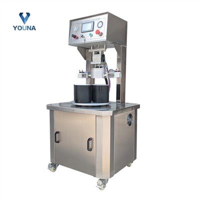 Машина для вакуумної герметизації скляних пляшок